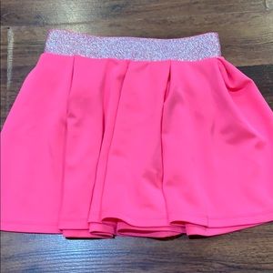 Bright pink skirt with silver.